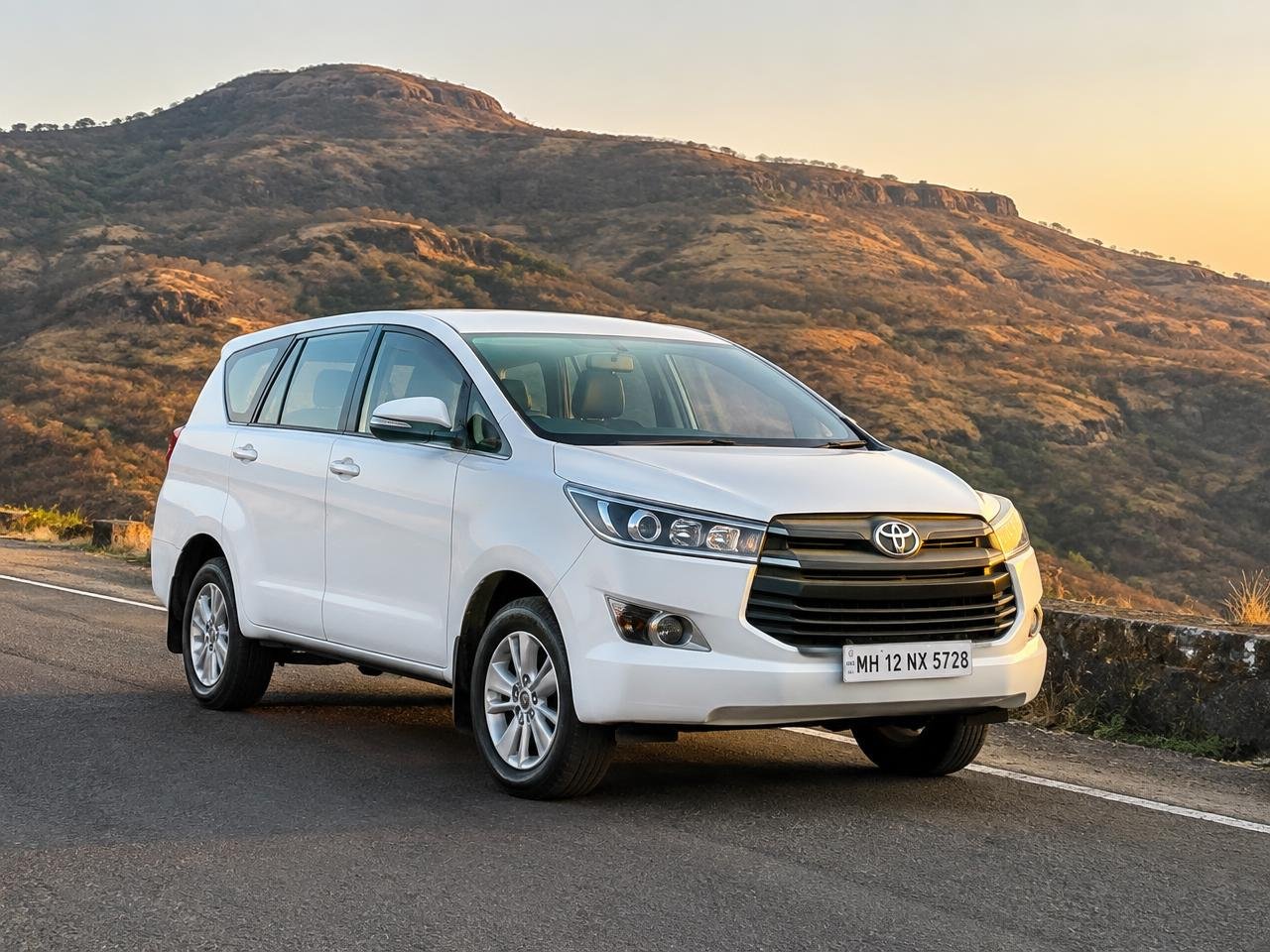 Representative photo of an SUV on a scenic road
